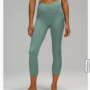 Lululemon Nulu and mesh 23” crop in tidewater teal size 6